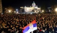  Protesters gather in front of Belgrade's city council building during a demonstration in Belgrade, on December 24, 2023. (Photo by OLIVER BUNIC / AFP)