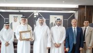 Minister of Environment and Climate Change H E Sheikh Dr. Faleh bin Nasser bin Ahmed bin Ali Al Thani and other officials with environmental certification by American Assessment Accreditation Services.