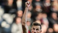 Nottingham Forest's New Zealand striker #11 Chris Wood celebrates after scoring his team first goal during the English Premier League football match between Newcastle United and Nottingham Forest at St James' Park in Newcastle-upon-Tyne, north east England on December 26, 2023. (Photo by ANDY BUCHANAN / AFP)