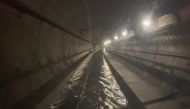 A frame grab taken from a handout video footage posted on the Southeastern Railway's X account on December 30, 2023 shows flooded water in a tunnel used by Eurostar trains, near Ebbsfleet International station in Kent, southern England. (Photo by Handout / Southeastern / ESN / AFP)
