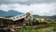 Search and rescue teams work at the scene of a train accident in Cicalengka, West Java province on January 5, 2024. Photo by ADI MARSIELA / AFP