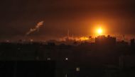  Israeli bombardment lights the skyline of Khan Yunis, pictured from Rafah in the southern Gaza Strip late on January 7, 2024. Photo by AFP