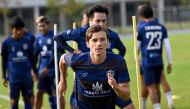 This photo taken on January 3, 2024 shows French footballer Antoine Lemarie (C) warming up during a training session with the Cambodian premier league's Boeung Ket FC team. (Photo by Tang Chhin Sothy / AFP)