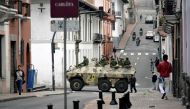 Ecuadorean security forces patrol the area around the main square and presidential palace after Ecuadorean President Daniel Noboa declared the country in a state of 