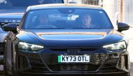 Britain's Prince William, Prince of Wales (L) drives himself away from the London Clinic in London on January 18, 2024 where his wife Britain's Catherine, Princess of Wales, underwent surgery. (Photo by HENRY NICHOLLS / AFP)
