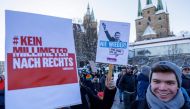 People take part in a demonstration against racism and far right politics, in Erfurt, eastern Germany on January 20, 2024. (Photo by JENS SCHLUETER / AFP)
