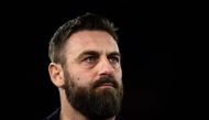 Roma's coach Daniele De Rossi looks on during the Italian Serie A football match between AS Roma and Hella Verona FC at the Olympic stadium in Rome on January 20, 2024. (Photo by Filippo MONTEFORTE / AFP)
