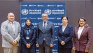 Minister of Public Health and President of the WHO Executive Board H E Dr. Hanan Mohammed Al Kuwari (second left) with other officials at the event.

