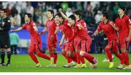 South Korea players celebrate after the win.