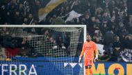 Milan’s goalkeeper Mike Maignan reacts during the Italian Serie A football match Udinese Calcio vs AC Milan at the Friuli - Dacia Arena stadium in Udine, on January 20, 2024. Photo by Gabriele MENIS / ANSA / AFP


