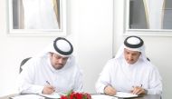 Qatar Scientific Club and Al Asmakh Charity Foundation officials signing the MoU.