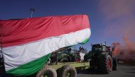 Italian farmers stage a protest at the entrance of the highway in Orte, central Italy, on February 3, 2024. (Photo by Andrea BERNARDI / AFP)
