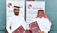 QC Acting General Manager Ali Saeed bu Sherbak Al Mansori and President of the Club, Ibrahim Khalid Al Sulaiti exchanging the signed agreements.