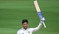 India's Shubman Gill celebrates after scoring a century at the YS Rajasekhara Reddy Cricket Stadium in Visakhapatnam on February 4, 2024. (Photo by Dibyangshu Sarkar / AFP) 