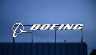 (Files) The Boeing Co. logo displayed outside company offices near Los Angeles International Airport (LAX) in El Segundo, California on January 18, 2024. (Photo by Patrick T. Fallon / AFP)
 