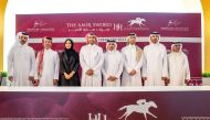 QREC Chairman Issa bin Mohammed Al Mohannadi, Acting CEO Bader Mohammed Al Darwish and Racing Manager Abdullah Rashid Al Kubaisi with representatives of sponsors for the H H The Amir Sword Festival 2024. PIC: Juahim/QREC