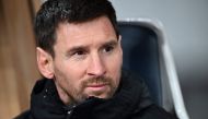 Inter Miami's Argentine forward Lionel Messi sits on the bench before the start of the friendly football match between Inter Miami of the US's Major League Soccer league and Vissel Kobe of Japan's J-League at the National Stadium in Tokyo on February 7, 2024. (Photo by Philip FONG / AFP)