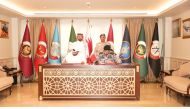 Chief of Staff of the Qatari Armed Forces H E Major General (Pilot) Salem bin Hamad bin Aqeel Al Nabit (back right) and Chief Executive Officer of QMC H E Sheikh Abdulaziz bin Thani Al Thani (back left) witnessing the agreement signing by Chairman of DIMDEX, Staff Brigadier (Sea) Abdulbaqi Saleh Al Ansari (right), and Director of Qatar TV Ali Saleh Al Sada.