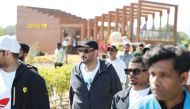 NCSA President H E Engineer Abdulrahman bin Ali Al Farahid Al Malki (centre) and others take park in a Sport Day event. 