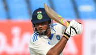 India's Sarfaraz Khan plays a shot during the first day of the third Test cricket match between India and England at Niranjan Shah stadium in Rajkot on February 15, 2024. (Photo by Punit PARANJPE / AFP) 