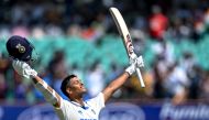 India's Yashasvi Jaiswal celebrates after scoring a double century (200 runs) during the fourth day of the third Test cricket match between India and England at the Niranjan Shah Stadium in Rajkot on February 18, 2024. (Photo by Punit Paranjpe / AFP) 