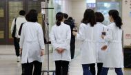Medical staff are seen at a university hospital in Gwangju on February 19, 2024. Photo by YONHAP / AFP