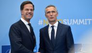 File: Netherland's Prime Minister Mark Rutte (left) shakes hands with NATO Secretary General Jens Stoltenberg during the NATO (North Atlantic Treaty Organization) summit, at the NATO headquarters in Brussels, on July 11, 2018.  (Photo by Denis Charlet / AFP)

