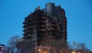 The aftermath of a huge fire that raged through a multistorey residential block killing at least four people, in Valencia in eastern Spain, on February 23, 2024. (Photo by JOSE JORDAN / AFP)