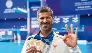 Mohammed Shewaiter celebrates with his gold medals.