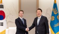 This handout photo taken on February 29, 2024 and released by South Korean Presidential Office via Yonhap shows South Korean President Yoon Suk Yeol (R) shaking hands with Mark Zuckerberg (L), head of US tech giant Meta, during their meeting at Yoon's office in Seoul. Photo by Handout / South Korean Presidential Office / AFP