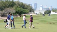 Saleh Al Kaabi celebrates after completing his round.