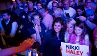 Republican presidential candidate, former UN Ambassador Nikki Haley poses for pictures with her supporters following a campaign rally on March 4, 2024 in Fort Worth, Texas. Emil Lippe/Getty Images/AFP 