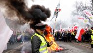 Polish farmers demonstrate against EU climate measures and Ukrainian imports on March 6, 2024 in Warsaw, Poland. (Photo by Wojtek Radwanski / AFP)
