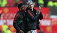 Manchester United's Ivorian midfielder #16 Amad Diallo (L) and Manchester United's Argentinian midfielder #17 Alejandro Garnacho (R) celebrate on the pitch after the English Premier League football match between Manchester United and Everton at Old Trafford in Manchester, north west England, on March 9, 2024. (Photo by Paul ELLIS / AFP)