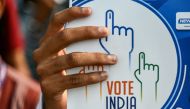 A student holds a placard during a rally to create awareness about the importance of voting ahead of the upcoming general elections, in Chennai on March 9, 2024. (Photo by R.Satish Babu / AFP)
