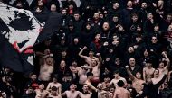 Milan fans cheer during the Italian Serie A football match between AC Milan and Empoli at San Siro stadium in Milan, on March 10, 2024. (Photo by GABRIEL BOUYS / AFP)
