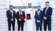 Qatar Charity and Lulu Hypermarket officials during the agreement signing in Doha recently.