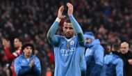 Manchester City's English defender #02 Kyle Walker (C) applauds the fans following during the English Premier League football match between Liverpool and Manchester City at Anfield in Liverpool, north west England on March 10, 2024. (Photo by Paul ELLIS / AFP) 