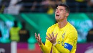 Nassr's Portuguese forward #07 Cristiano Ronaldo reacts during the AFC Champions League football match between Saudi Arabia's Al-Nassr and UAE's Al-Ain at Al-Awal Park Stadium in Riyadh on March 11, 2024. (Photo by Fayez Nureldine / AFP)