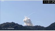 A frame grab taken from AFPTV via online footage broadcast by Wakayama Telecasting Corp. (WTV) on March 13, 2024 shows smoke rising after the Space One rocket exploded upon take-off. (Photo by AFPTV / AFP) 