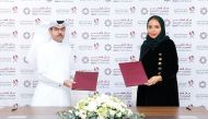 Qatar Credit Bureau CEO Sheikha Maryam bint Khalifa Al Thani and Manateq Acting CEO Engineer Mohammed Lutfalla Al Emadi during the agreement signing.