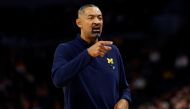 Head coach Juwan Howard of the Michigan Wolverines gestures against the Penn State Nittany Lions in the first half in the First Round of the Big Ten Tournament at Target Center on March 13, 2024 in Minneapolis, Minnesota. (Photo by David Berding / GETTY IMAGES NORTH AMERICA / Getty Images via AFP)
