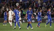 Getafe's Paraguayan defender #15 Omar Alderete and teammates celebrate their win at the end of the Spanish league football match between Getafe CF and Girona FC at the Col. Alfonso Perez stadium in Getafe on March 16, 2024. (Photo by Thomas COEX / AFP)
