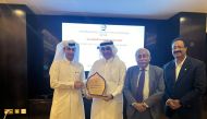 Chief Guest Nasser Jeham Al Kuwari gives away the Automation Excellence in Industry Award to Abdulla Mohd Abdulla Al Safran in the presence of ISA Qatar officials.