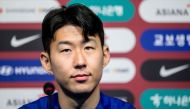 South Korean national football team captain Son Heung-min listens to a question during a press conference before team practice sessions at Seoul World Cup Stadium on March 20, 2024, a day ahead of the FIFA World Cup Asian qualifiers second round group C match between South Korea and Thailand. (Photo by ANTHONY WALLACE / AFP)