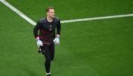 (FILES) Germany's goalkeeper #01 Manuel Neuer warms up before the Qatar 2022 World Cup Group E football match between Costa Rica and Germany at the Al-Bayt Stadium in Al Khor, north of Doha on December 1, 2022. (Photo by FRANCK FIFE / AFP)
