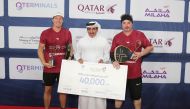 Minister of Transport H E Jassim Saif Ahmed Al Sulaiti with the Qatar Airways team at end of the tournament.