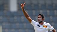Sri Lanka's Kasun Rajitha celebrates after taking the wicket of Bangladesh's Mehidy Hasan Miraz during the fourth day of the first Test cricket match between Bangladesh and Sri Lanka at the Sylhet International cricket Stadium in Sylhet on March 25, 2024. (Photo by MUNIR UZ ZAMAN / AFP)