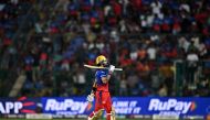 Royal Challengers Bengaluru's Virat Kohli walks back to the pavilion after his dismissal during the Indian Premier League (IPL) Twenty20 cricket match between Royal Challengers Bengaluru and Punjab Kings at the M. Chinnaswamy Stadium in Bengaluru on March 25, 2024. (Photo by Idrees MOHAMMED / AFP)