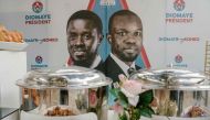 A general view of a prepared buffet for Iftar at Diomaye's coalition headquarters as the votes are being counted, in Liberte 4, Dakar, on March 24, 2024 during the Senegalese presidential elections. (Photo by Carmen Abd Ali / AFP)
